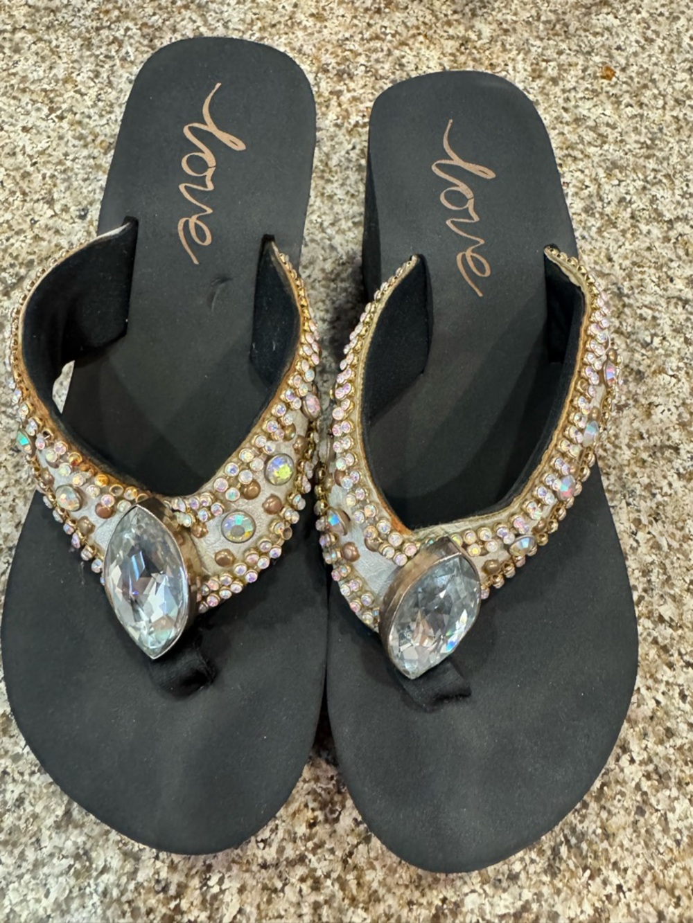 Love Black Flip Flop Sandals with Gold Trim and Iridescent Gem Accents